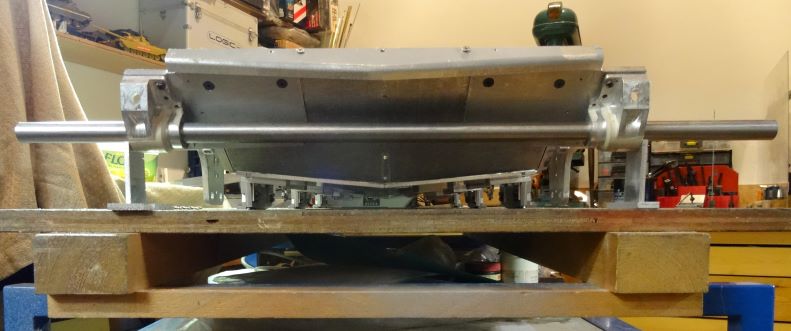 aligning the idler swing arm housings