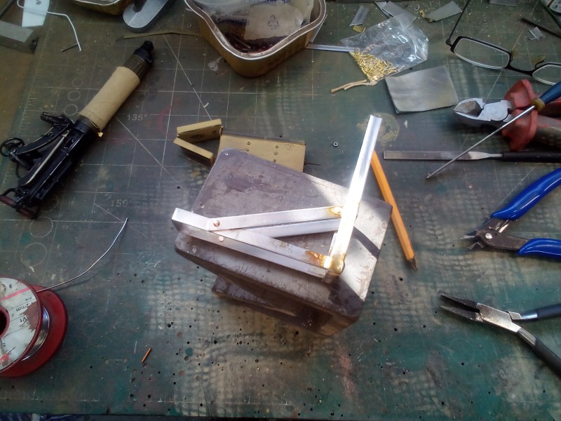 Solder and rivet construction