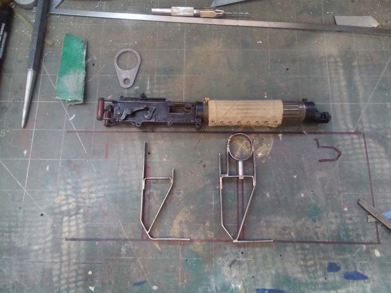 I've managed to silver solder a tiny working  hinge to the metal  strap