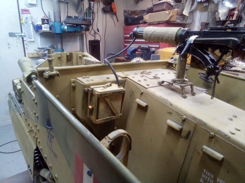 The two gallon water coolant can safely mounted