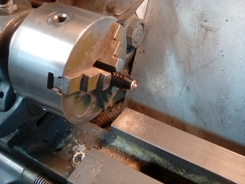 A pin drill collet is great for holding the tiny 12 ba bolts