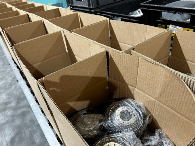 Roadwheels getting individually wrapped and boxed