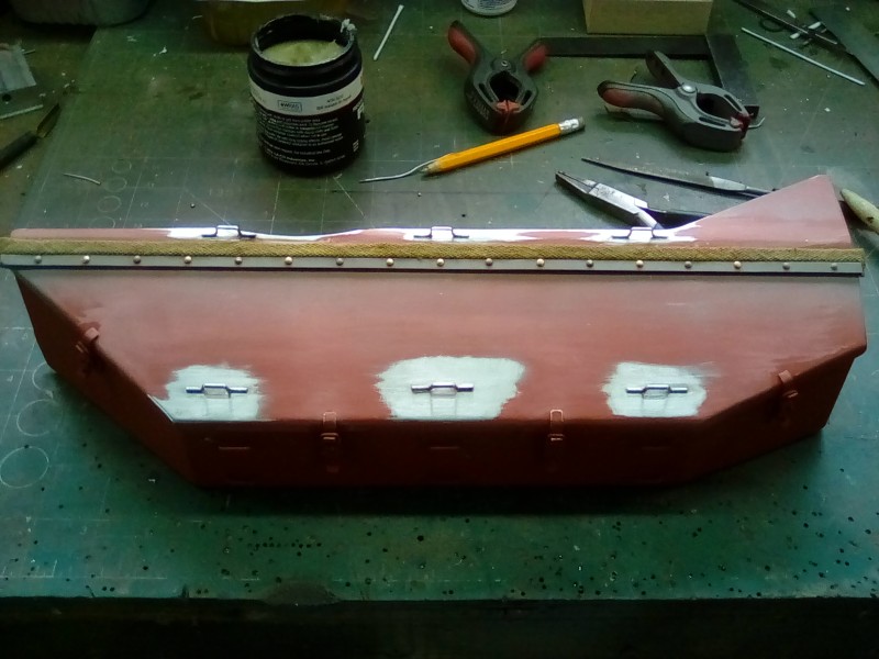 I've removed the light dusting of red oxide prior to soldering the catches and the strap anchors