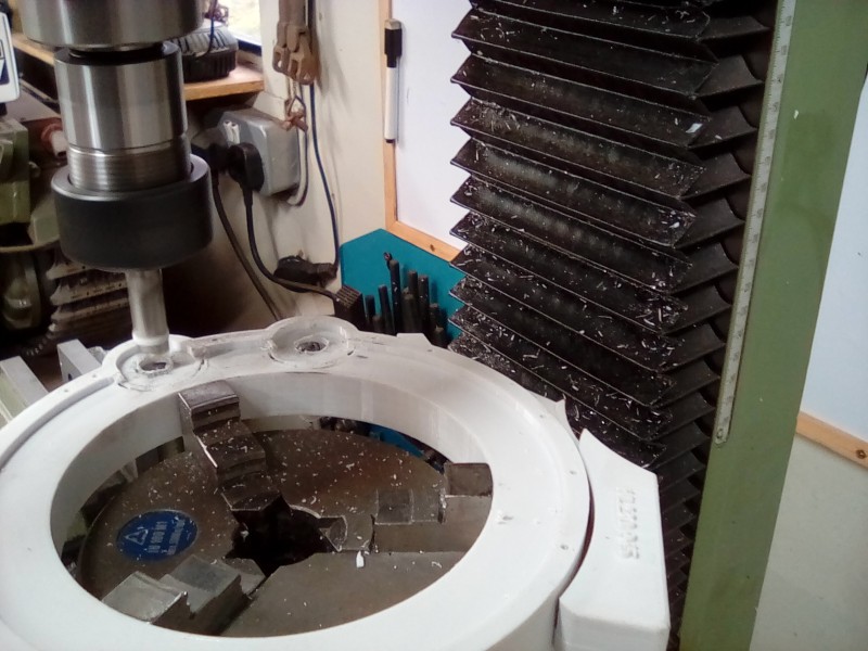 I'm milling the holes for the starter gear position bushes, plural as there are two.