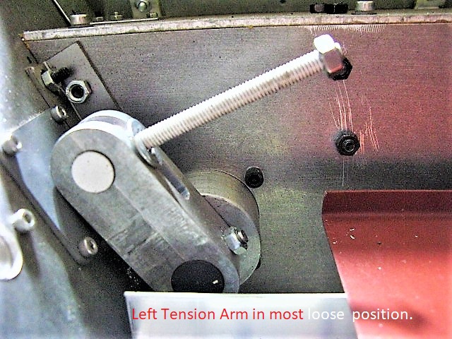 The left Tension Arm in most backward (ie, to loosen the left track) position.