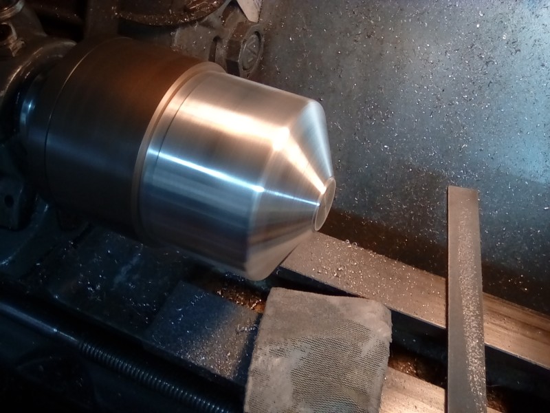 I'm forming the radius by hand as the workpiece and tool would no doubt chatter if I used a form tool.