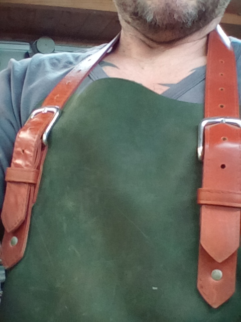 I use this posh hand made leather apron for the dirty jobs, it has a front pocket too.