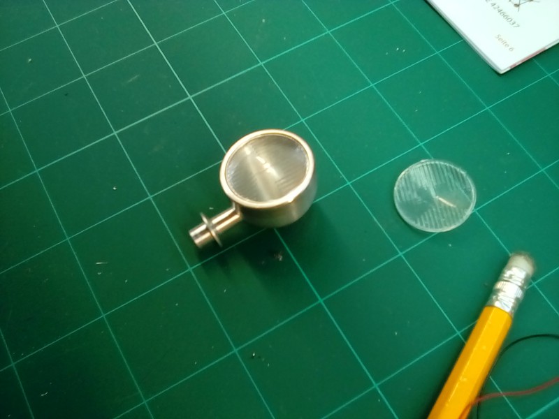 These stock parts are not far off but do need that big bezel