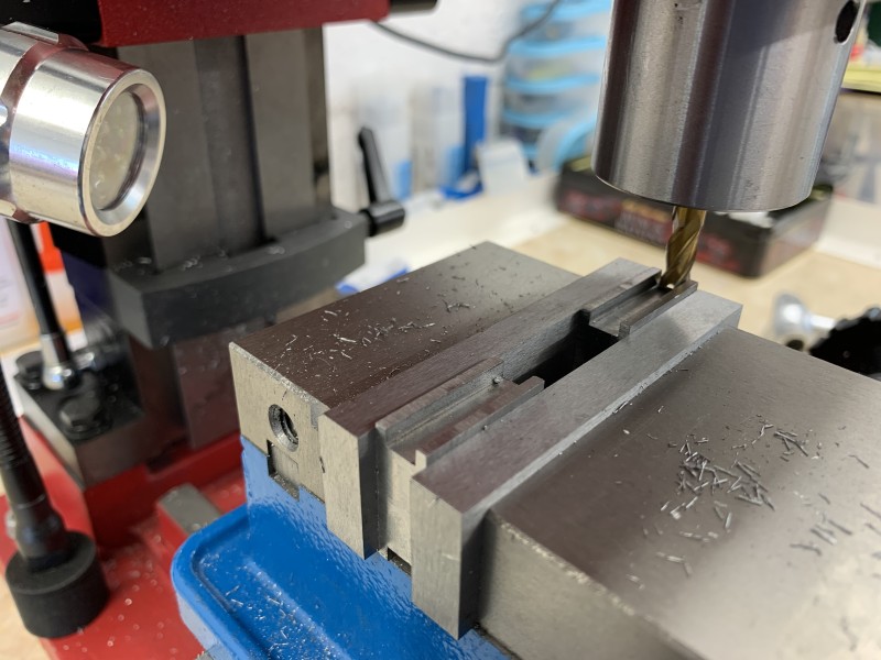 Milling the idler adjuster blocks