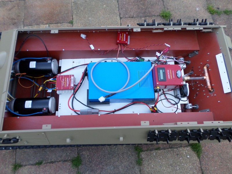 Innards of the removable base plate with battery box