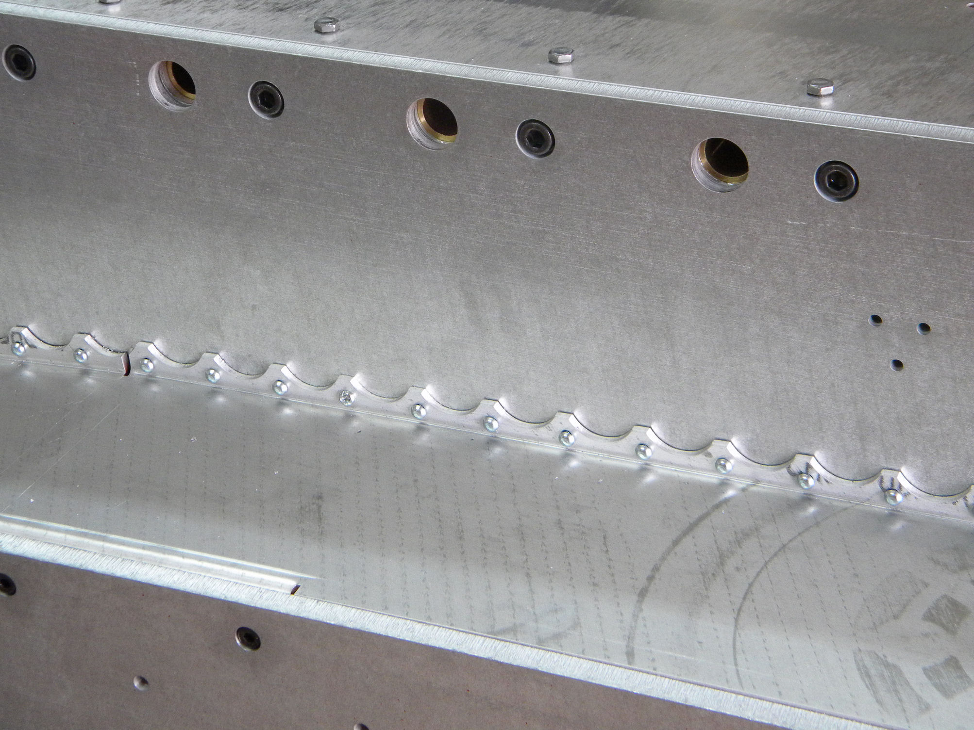 After drilling and rivets.