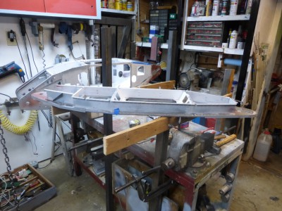 Wood frame over rivet snap in vise