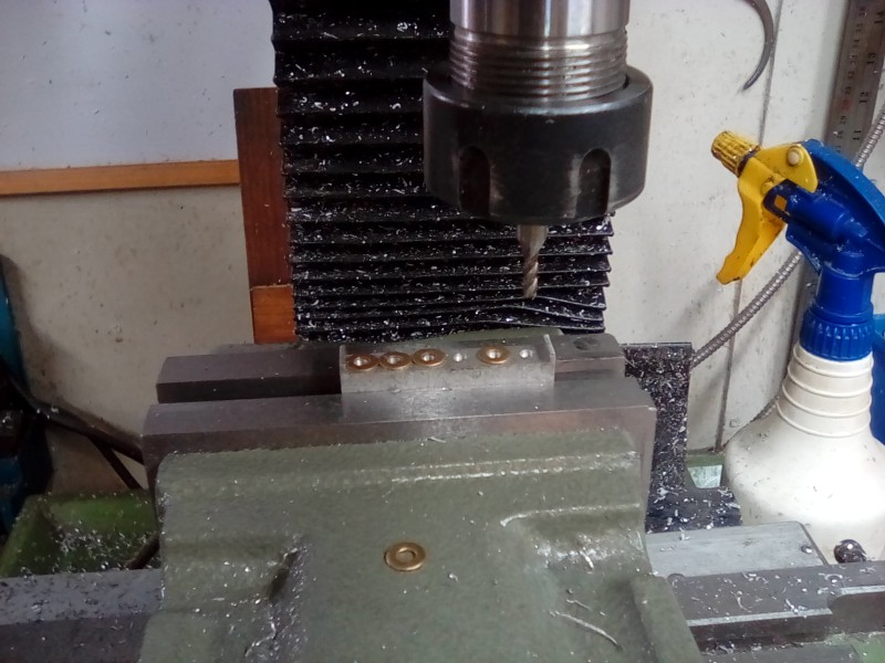 Drilling and tapping for the rod threads