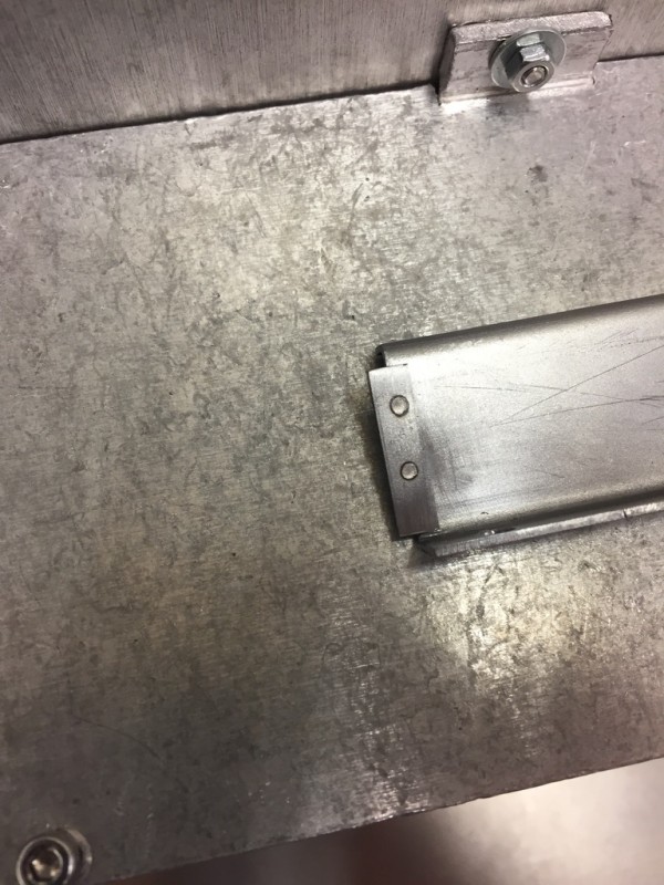 Joining plates were spot welded to the ends of the middle section.