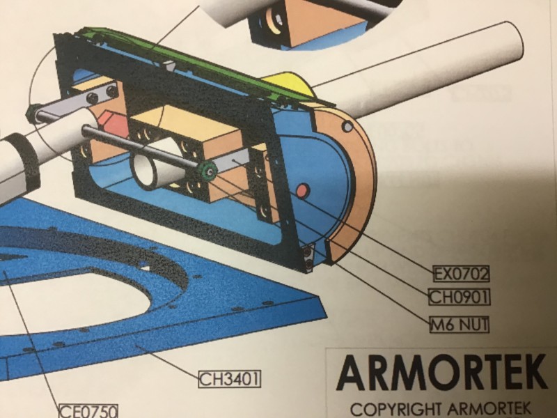 The instructions show parts EX0702 as straight lengths of plate with 2 mounting holes and a larger hole for the shaft.