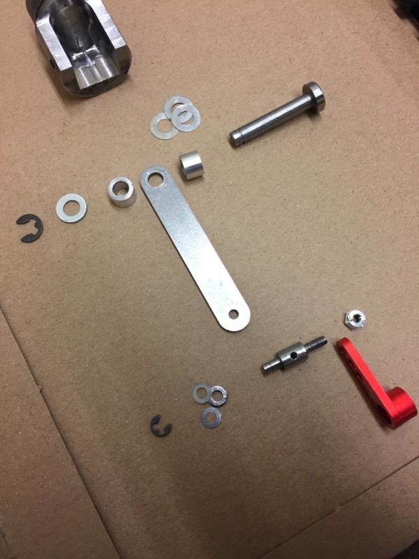 I found the barrel recoil mechanism was perfectly functional but allowed for rotational play in the barrel. I figured that would cause the muzzle brake to sit at weird angles. So I took some accurate measurements and had various parts made. The bit that screws into the barrel I had the internal sides machined square, they were curved, so the spacers would sit flush against them. Left a tiny amount of wiggle room so I could shim on final alignment.