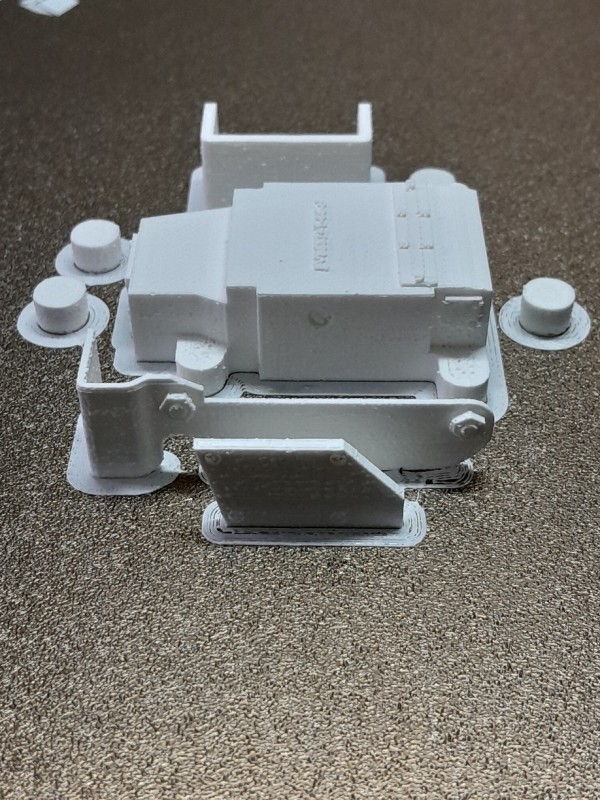 Parts on print bed.  As you can see the top cover and thin side cover were printed vertically. They gave me a lot of trouble and at least with my printer printing them like this gave the best (not perfect) results.