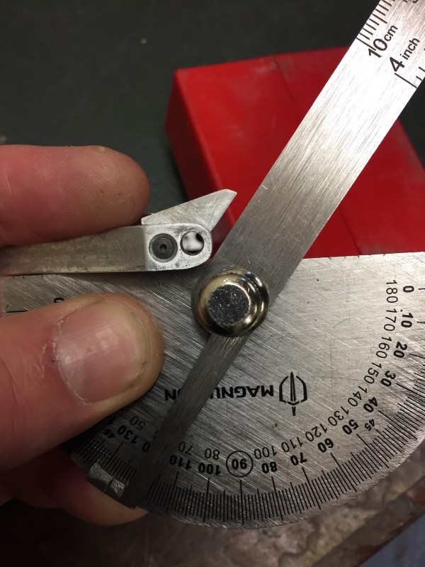 Hope that is of some use. It is approx 126 deg or 54 depending which way you are looking at it. But as I say that is a very crude way of measuring it, maybe try it on a scrap piece first. Good luck, regards Dave.