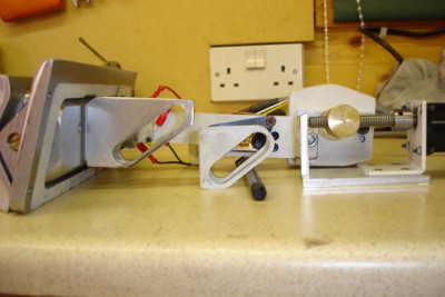 By moving the guide bracket further back into the turret there is room for the leadscrew support post fit in.