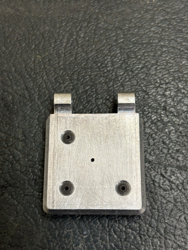 Then drilled through all the pieces with the tapping size drill. Dissasembled, then clearance holes through the first two pieces and tapped the last part.