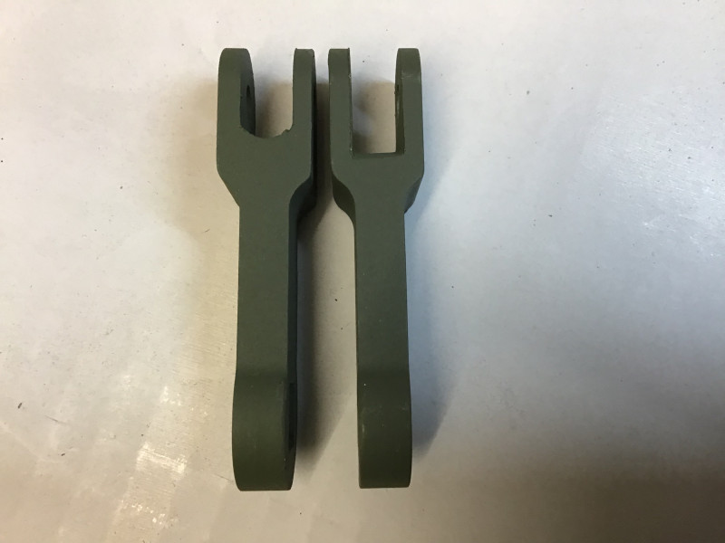 The damper arms require some material removing to prevent them binding up as the suspension arms move. Left arm is unmodified and the right modified