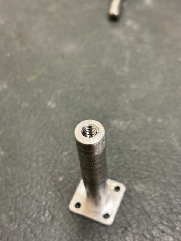 The original hole size was correct for an m6 thread, so ran a tap down it.