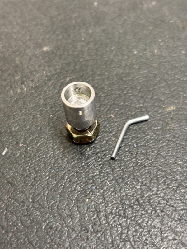 Little retaining pin out of a pop rivet.