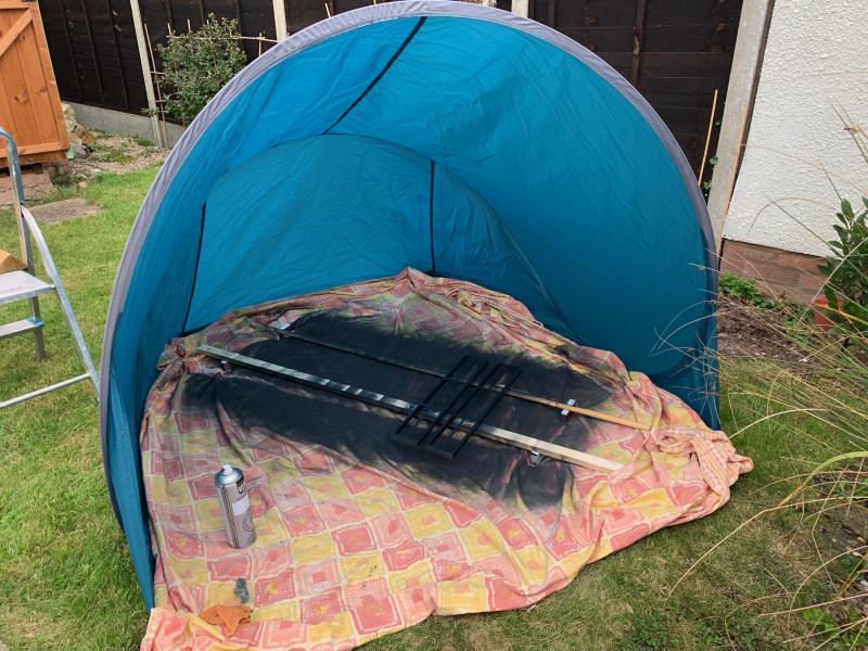 Using a pop up shelter as a spray booth