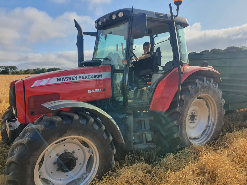 Tiny on his tea break learning to operate the tractor