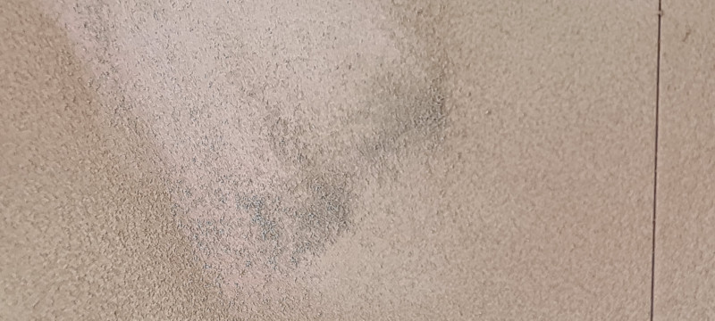 The dust that gathers when rubbed with finger