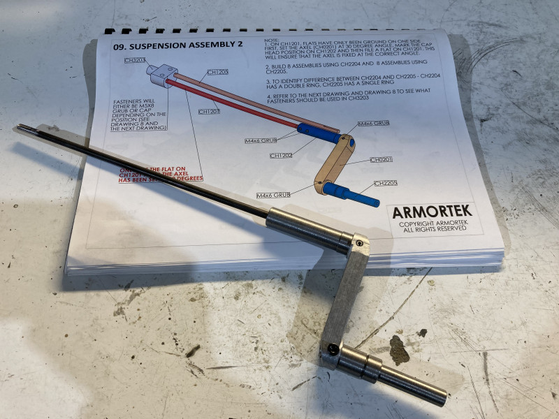 torsion bar and suspension shaft and suspension arm/axle  assembly