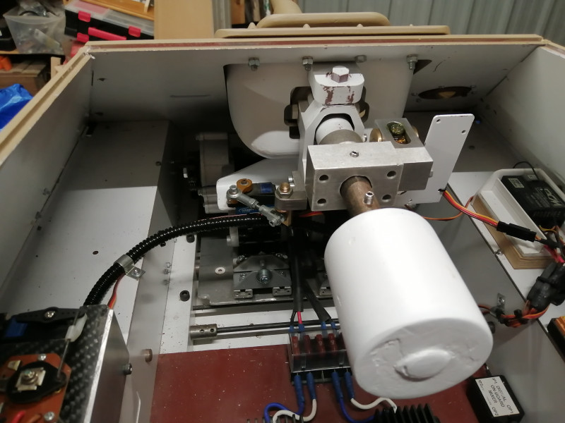 Overall view of the gun unit.  The rather ugly white cylinder is the 2.8 kilo counterbalance necessary for equilibrium so as not to stress the motor and elevating gearing