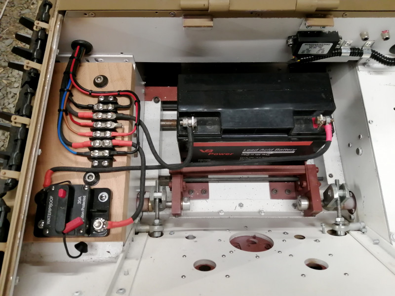 Overall view of engine bay with first of the 2 batteries