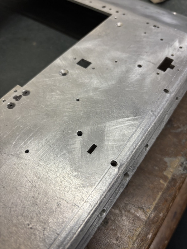 Then drilled and filed a little slot for the other bracket.