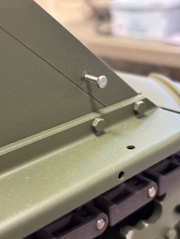 The holes in the glacis were m3 thread, so I drilled and tapped them for an m4 thread. Then made a couple of thread inserts to get down to the m2 thread I required and thread locked the inserts in.
